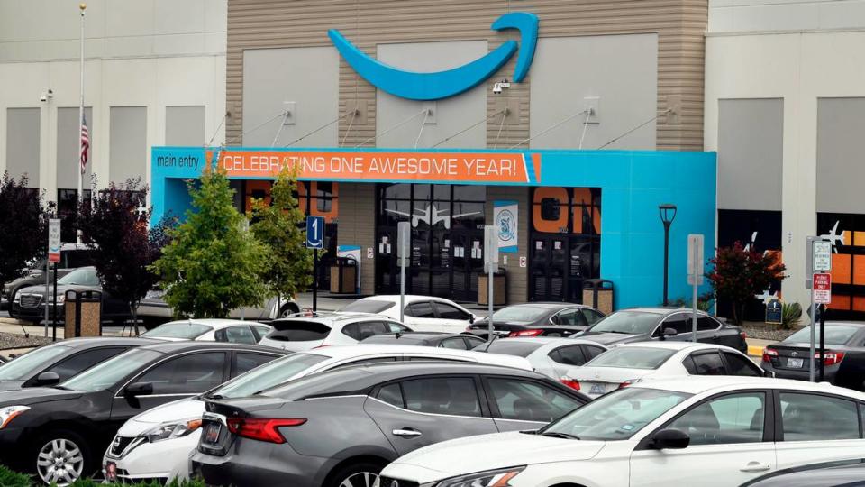 Amazon has informed warehouse workers that they will be required to wear a mask inside operations facilities, including this large operation in Garner, N.C., regardless of their vaccination status.