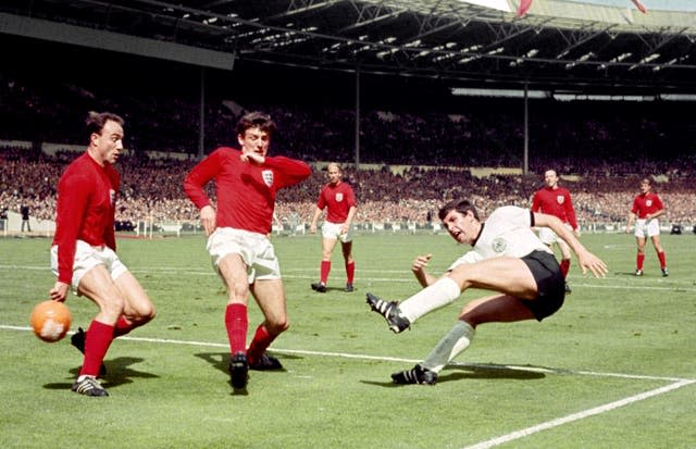 George Cohen, left, in action in the 1966 World Cup final