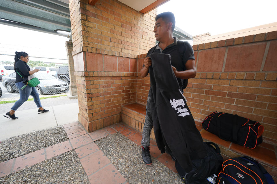 Ricardo Cayetano, of Guerrero, Mexico, looks on after being processed by immigration officials at the McAllen-Hidalgo International Bridge, Friday, May 12, 2023, in Hidalgo, Texas. (AP Photo/Julio Cortez)