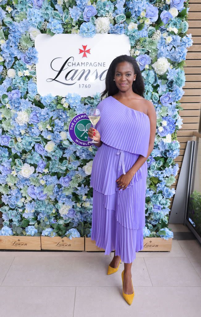 <p>Oti Mabuse wore summery purple pleats with contrasting yellow shoes. </p>