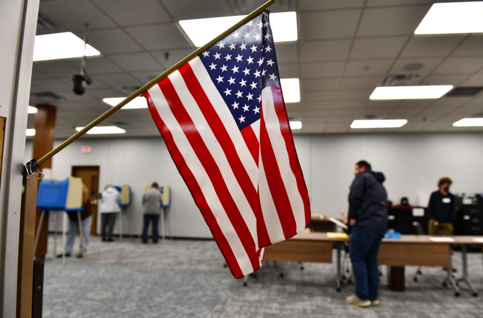 People check-in and vote during general election voting at St. Cloud City Hall Tuesday, Nov. 8, 2022. 