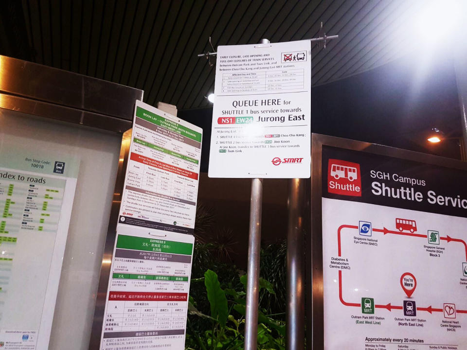 Signs demarcating the shuttle bus point were in place up to an hour before train service ended. PHOTO: Wan Ting Koh/Yahoo News Singapore