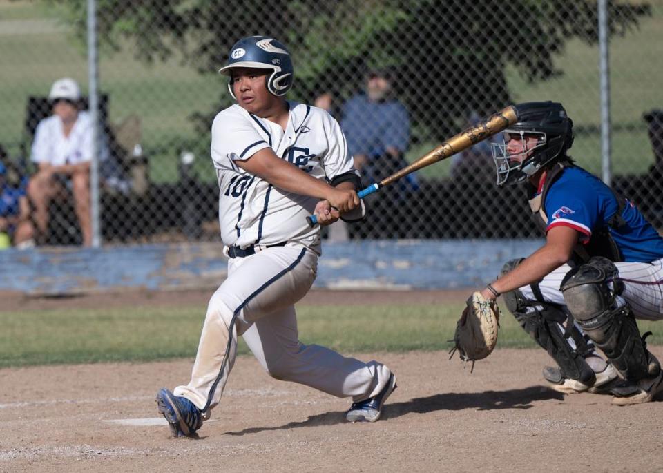 Central Catholic’s Xavier Diep hits a RBI single during the Division III Sac-Joaquin Section playoff game with Christian Brothers at Central Catholic High School in Modesto, Calif., Wednesday, May 17, 2023. The Raiders won the game 8-1.