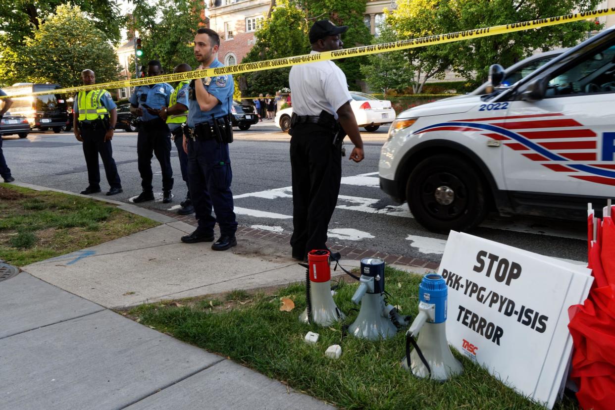 Fighting broke out between protestors and bodyguards outside the Turkish embassy in Washington, DC during a visit by Turkish President Recep Tayyip Erdogan: DAVE CLARK/AFP/Getty Images