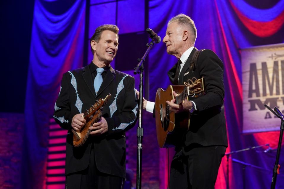 NASHVILLE, TENNESSEE - SEPTEMBER 14: Chris Isaak and Lyle Lovett perform onstage for the 21st Annual Americana Honors & Awards at Ryman Auditorium on September 14, 2022 in Nashville, Tennessee. (Photo by Erika Goldring/Getty Images for Americana Music Association )