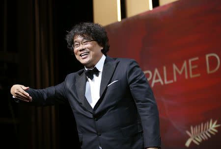 72nd Cannes Film Festival - Closing ceremony - Cannes, France, May 25, 2019. Director Bong Joon-ho, Palme d'Or award winner for his film "Parasite" (Gisaengchung), reacts. REUTERS/Stephane Mahe