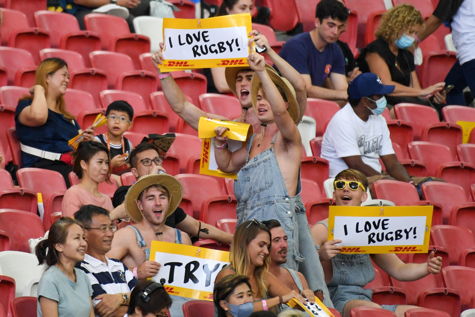 Fans attending the HSBC Singapore Rugby Sevens tournament.