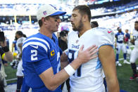 Indianapolis Colts quarterback Matt Ryan meets with Tennessee Titans tight end Austin Hooper following an NFL football game in Indianapolis, Fla., Sunday, Oct. 2, 2022. The Titans defeated the Colts 24-17. (AP Photo/AJ Mast)