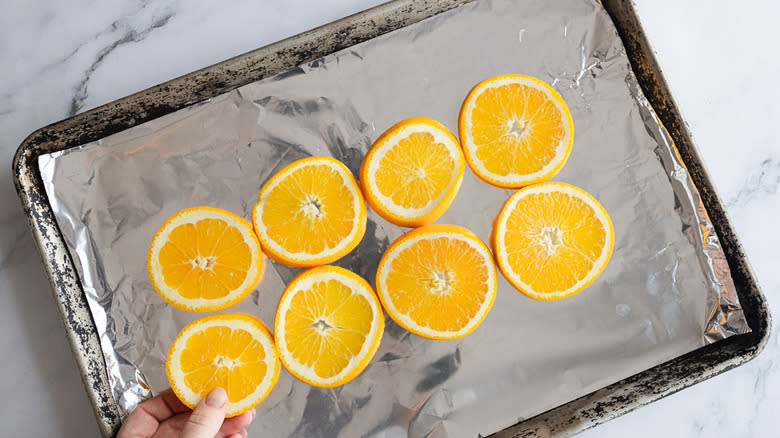 orange slices on baking sheet