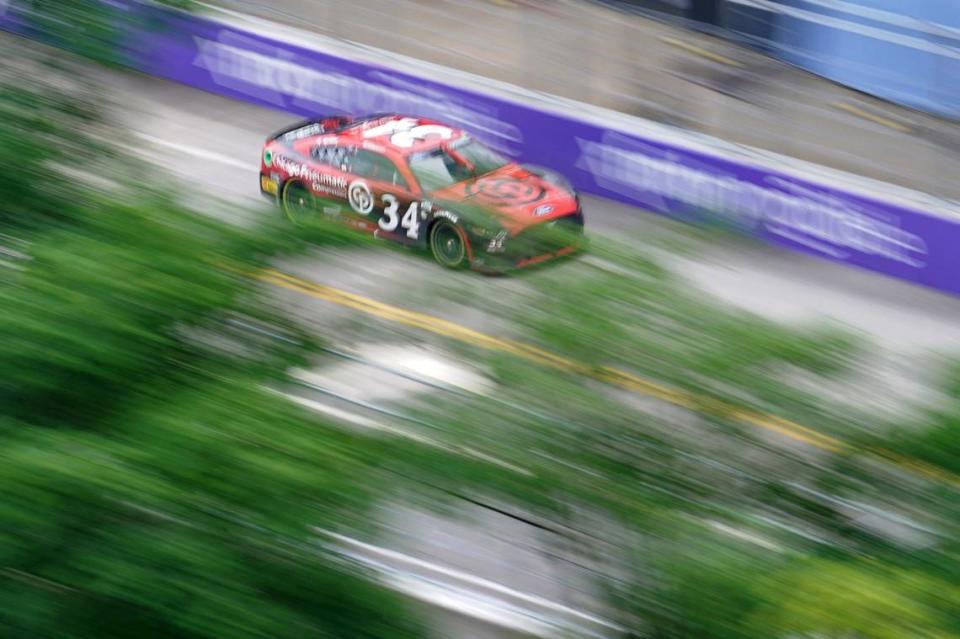 Jul 2, 2023; Chicago, Illinois, USA; NASCAR Cup Series driver Michael McDowell (34) races along Grant Park during the Grant Park 220 of the Chicago Street Race viewed from the eRacing Association turn 7 Skydeck at Venue Six10. Mandatory Credit: Jon Durr-USA TODAY Sports Jon Durr/Jon Durr-USA TODAY Sports