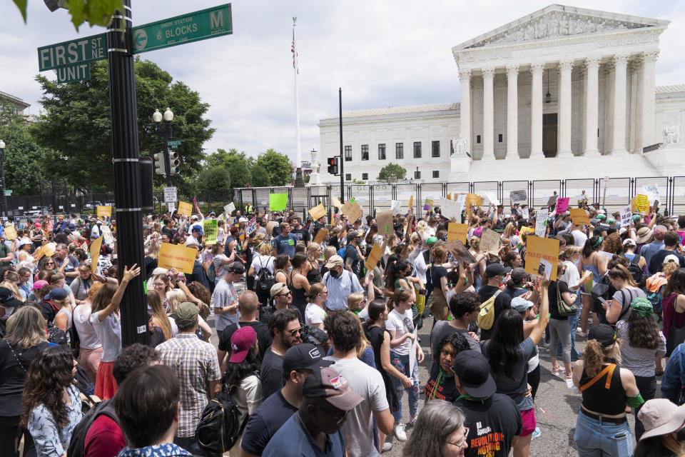 Protesters gather outside the Supreme Court in Washington, Friday, June 24, 2022. The Supreme Court has ended constitutional protections for abortion that had been in place nearly 50 years, a decision by its conservative majority to overturn the court's landmark abortion cases. (AP Photo/Jacquelyn Martin)