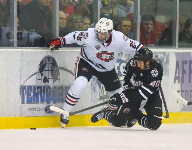 Which SCSU hockey players were named to Olympic rosters?