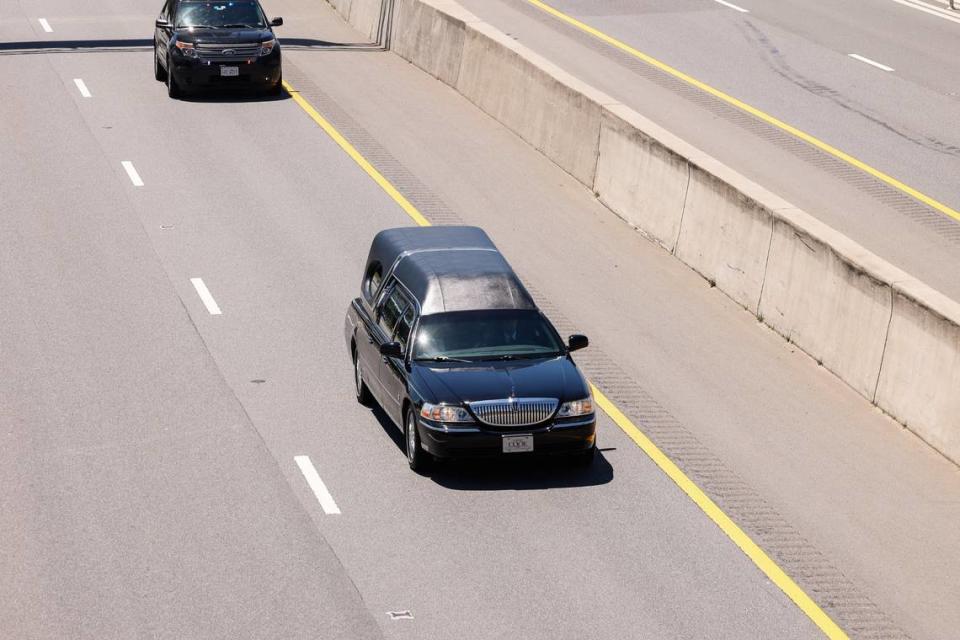 A law enforcement processional for Deputy U.S. Marshal Thomas “Tommy” Weeks Jr. goes along Interstate 77 at exit 28 from Charlotte to Mooresville on Wednesday, May 1, 2024. Weeks, a 48-year Mooresville father of four, died in Monday’s Charlotte shooting where four law enforcement officers died and four more were wounded.