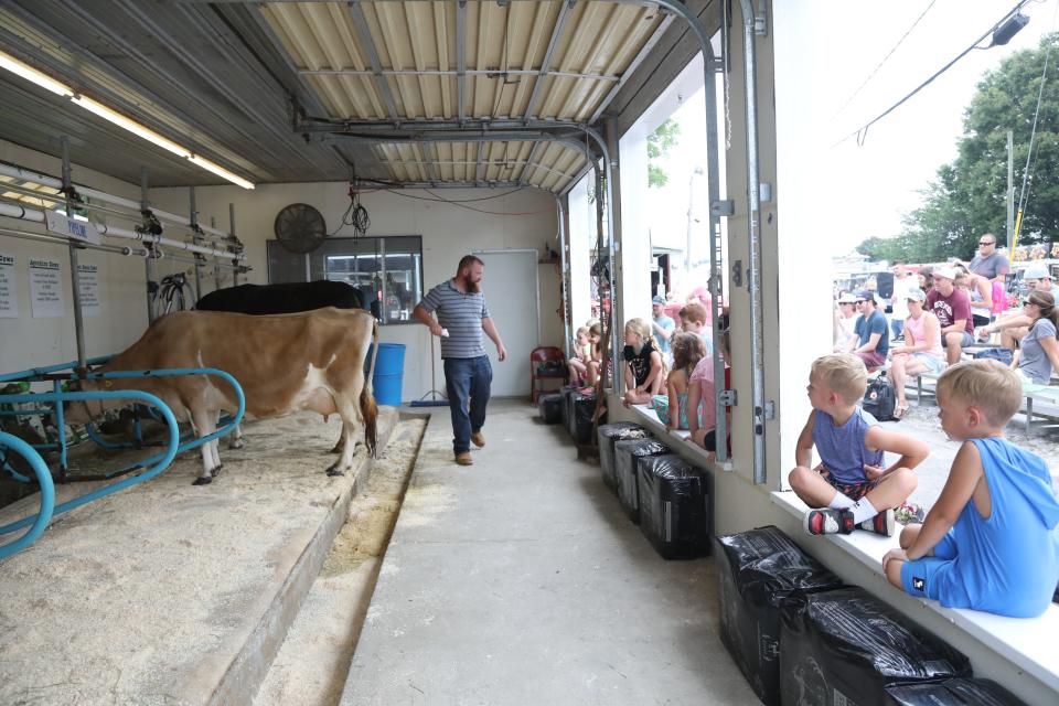 The cow milking demonstration during opening day at the 2021 New Jersey State Fair/Sussex County Farm & Horse Show as it returned to the fairgrounds in Augusta, NJ after missing last year due to the pandemic.