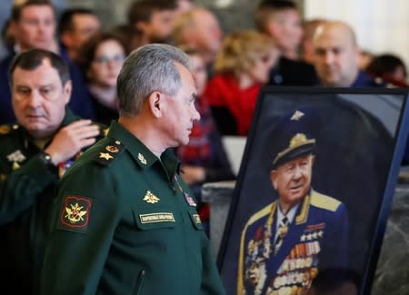 Russian Defence Minister Sergei Shoigu attends sa mourning ceremony and a funeral for Alexei Leonov, the first man to conduct a space walk in 1965, in Mytishchi, outside Moscow