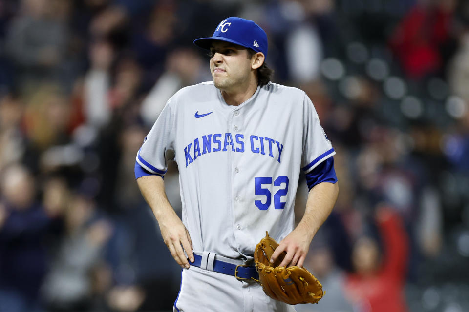 Kansas City Royals starting pitcher Daniel Lynch reacts after giving up a two-run home run to Cleveland Guardians' Owen Miller during the fifth inning of a baseball game, Tuesday, Oct. 4, 2022, in Cleveland. (AP Photo/Ron Schwane)