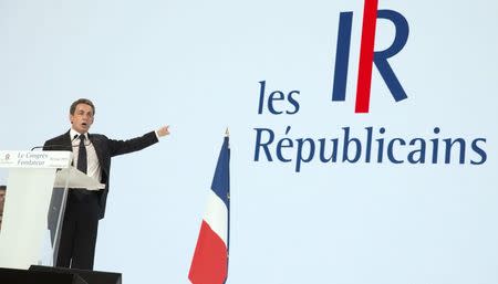 Nicolas Sarkozy, former French president and head of the newly-named The Republicans political party, delivers a speech during a rally in Paris, France, May 30, 2015. REUTERS/Philippe Wojazer