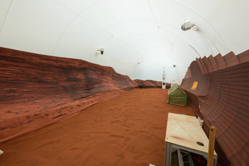 <div class="inline-image__caption"><p>NASA’s simulated Mars habitat includes a 1,200-square-foot sandbox with red sand to simulate the Martian landscape. The area will be used to conduct simulated spacewalks or “Mars walks” during the analog missions.</p></div> <div class="inline-image__credit">Bill Stafford NASA-JSC Houston Texas</div>