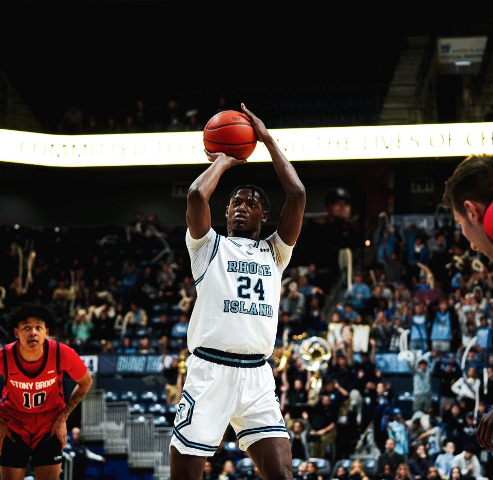 URI's Louis Hutchinson takes a jump shot against Stony Brook during their game in November.