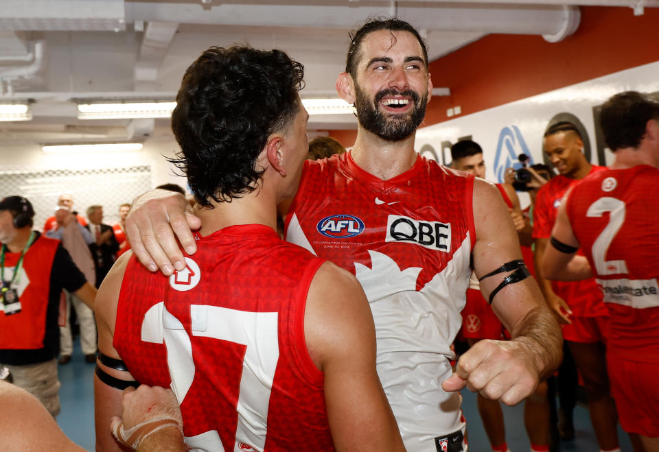 Brodie Grundy celebrates.