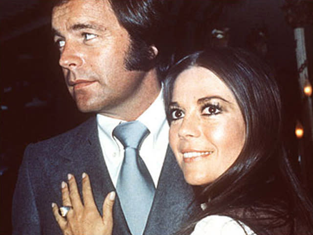 Actor Robert Wagner and Natalie Wood on board the Queen Elizabeth II in April 1972, after a hectic storm at sea. / Credit: AP Photo/Steve Wood
