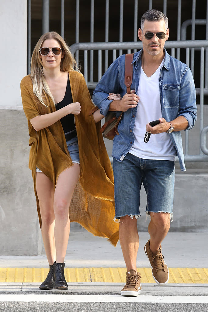 <p>Their yoga pants must have been in the laundry! Because LeAnn and Eddie sure were stylin’ as they left Los Angeles International Airport. (Photo: FOXY/BACKGRID) </p>