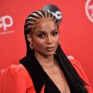 There is no hairstyle more classic than a good set of straight-back cornrows. While this could be considered one of the more basic cornrow styles, it's easy to elevate the look to make it more special. For the 2020 American Music Awards, Ciara wore hers with a swooping, swirling set of baby hairs.