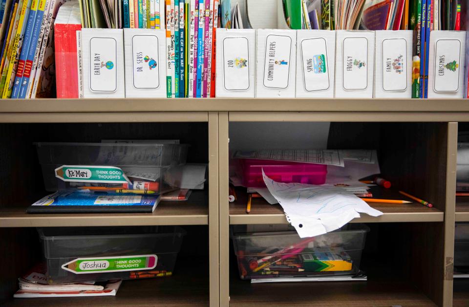 Cubbies are still full in a first grade class that now sits empty at Oyler School in Lower Price Hill after Cincinnati Public Schools switched to remote learning Jan. 12, 2022. The plan is to return to the classroom Monday, Jan. 24. 