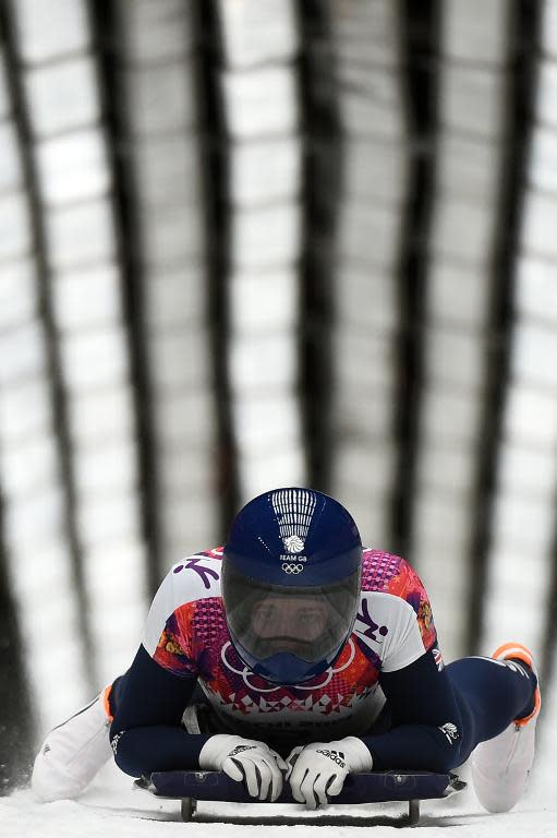 Great Britain's Elizabeth Yarnold finishes her run during the Women's Skeleton of the Sochi Winter Olympics on February 14, 2014 at the Sanki Sliding Center
