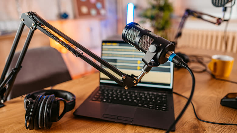 podcast setup with microphone and laptop