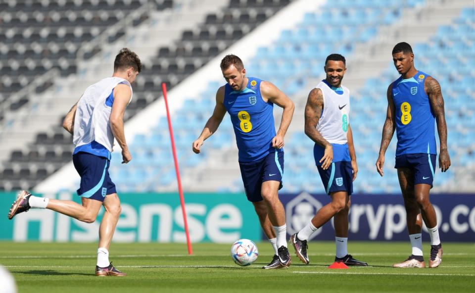 John Stones, Harry Kane, Callum Wilson and Marcus Rashford during a training session at the Al Wakrah Sports Club Stadium in Al Wakrah, Qatar (PA)