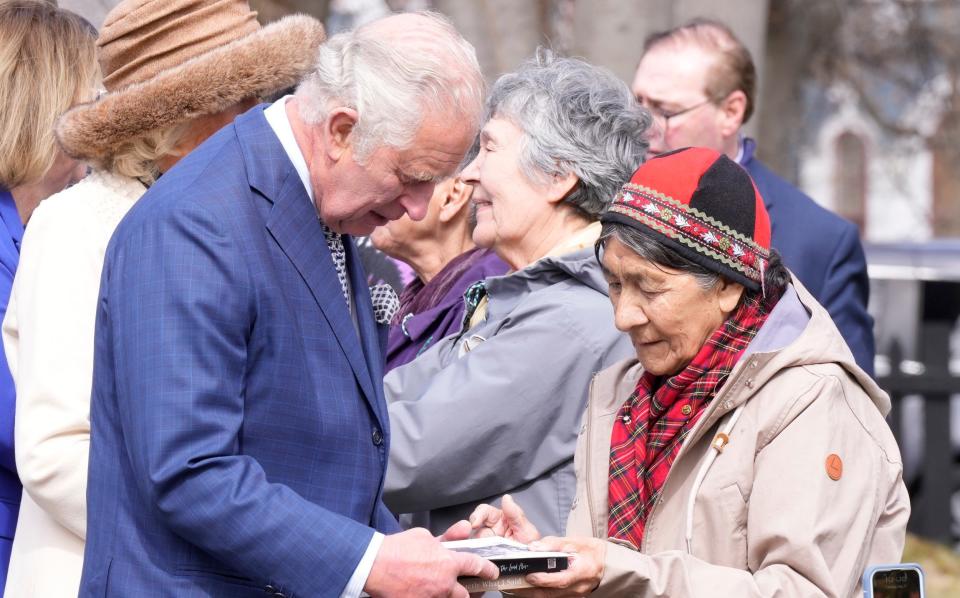 Charles and Camilla with residential school survivors and elders - Paul Chiasson/The Canadian Press