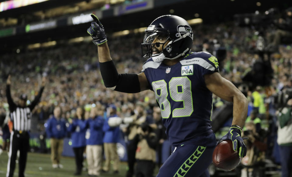 Seattle Seahawks wide receiver Doug Baldwin celebrates after catching a pass for a touchdown against the Green Bay Packers during the first half of an NFL football game Thursday, Nov. 15, 2018, in Seattle. (AP Photo/Stephen Brashear)