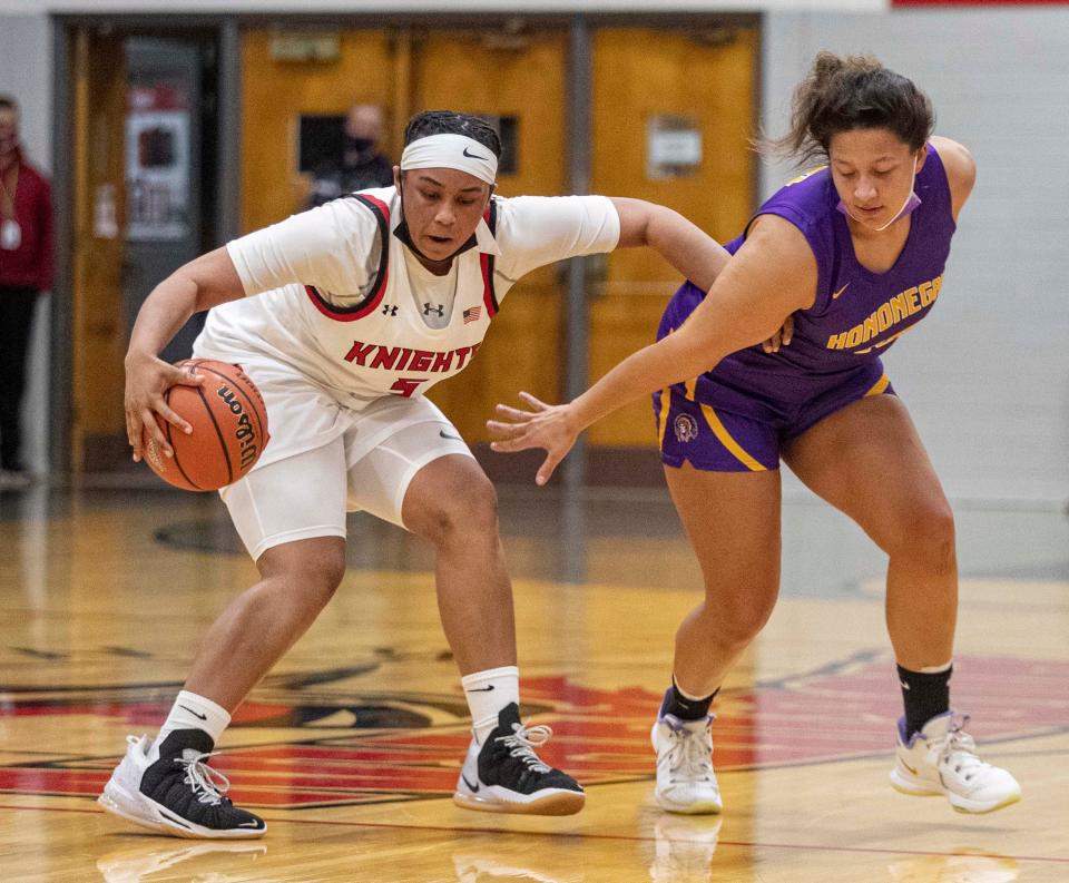 Auburn's Brooklyn Gray steals the ball from Hononegah's Geneva Hann at Auburn High School on Tuesday, Nov. 30, 2021, in Rockford.