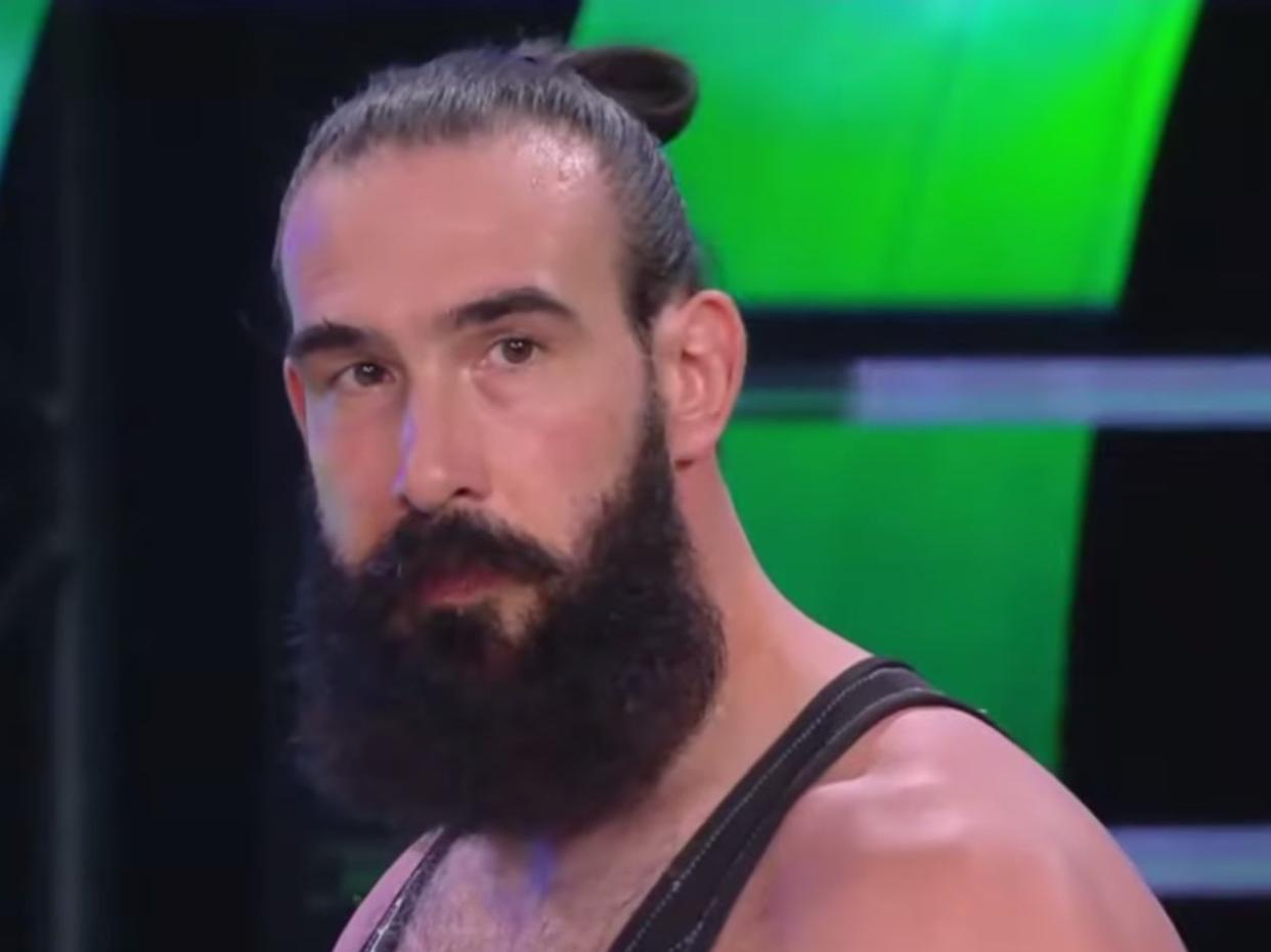 <p>Jonathan Huber as Luke Harper in the ring for World Wrestling Entertainment</p> ((WWE via WithoutFreedom - YouTube))