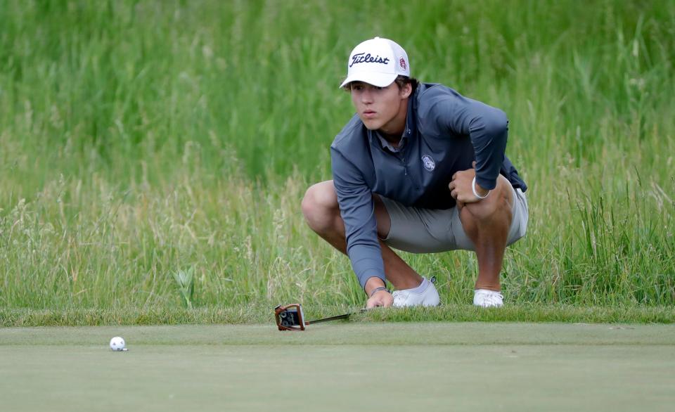 Winneconne's Winston Knobloch reads the green during the WIAA state boys golf championships Tuesday at Blackwolf Run in Kohler.