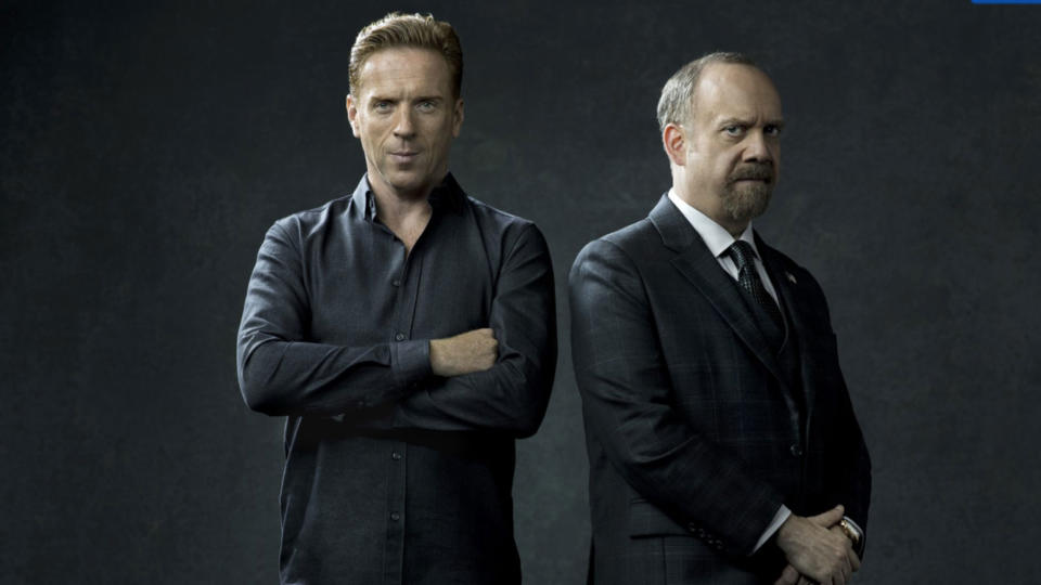 (L, R) Damian Lewis as Bobby Axelrod, and Paul Giamatti as Chuck Rhoades in Billions