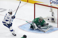 Tampa Bay Lightning's Pat Maroon (14) watches the puck go in past Dallas Stars' goalie Anton Khudobin (35) on a shot from Lightning's Blake Coleman (not shown) during second-period NHL Stanley Cup finals hockey game action in Edmonton, Alberta, Monday, Sept. 28, 2020. (Jason Franson/The Canadian Press via AP)