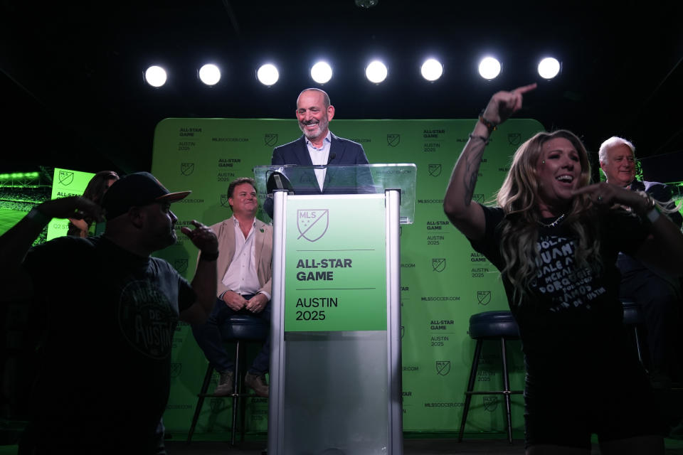 Fans cheer after Major League Soccer Commissioner Don Garber, center, announced that Austin FC will host the 2025 MLS All-Star soccer game, Wednesday, May 15, 2024, in Austin, Texas. (AP Photo/Eric Gay)