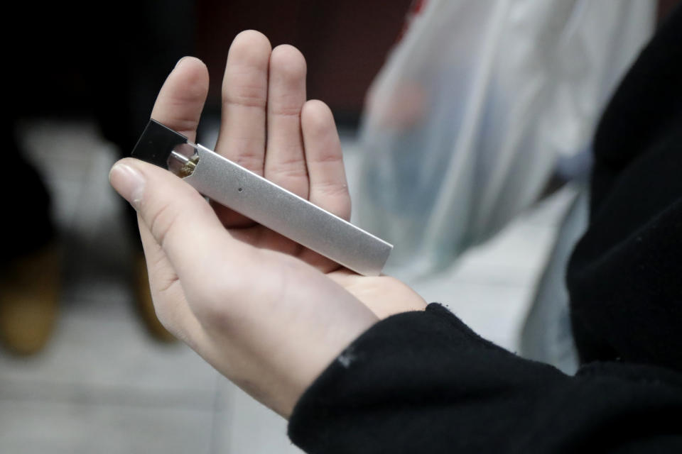 Popular e-cigarette Juul was made with a small, sleek design that critics now say contributed to the spike in teen use. (Photo: AP/Julio Cortez)