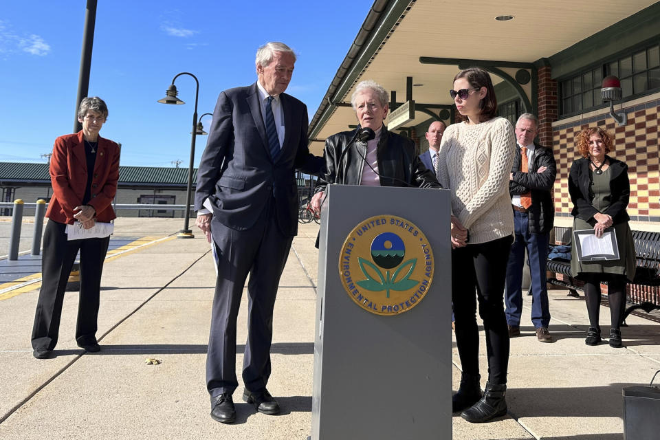 Massachusetts Sen. Edward Markey, left, stands in support of Anne Anderson, whose son died of leukemia in 1981 and was exposed to water contaminated with the chemical trichloroethylene, or TCE. The two spoke Monday, Oct. 23, 2023, in Woburn, Mass., during an EPA press conference announcing its proposal to ban the chemical. (AP Photo/Michael Casey)