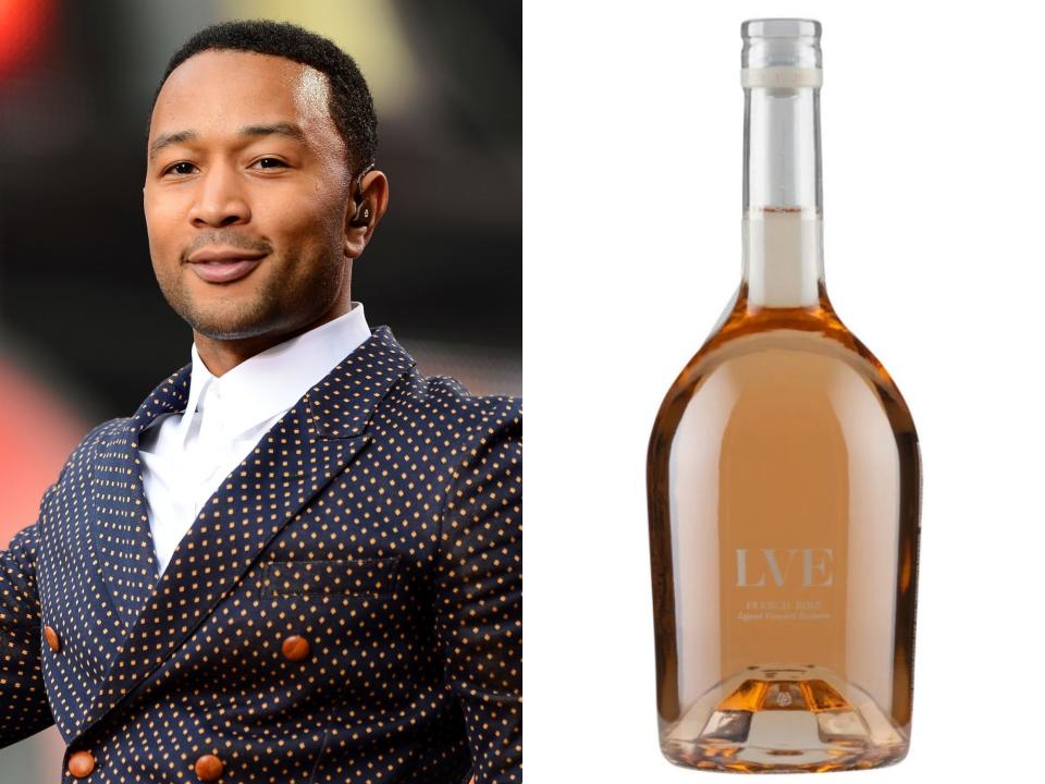 John Legend next to his wine LVE.