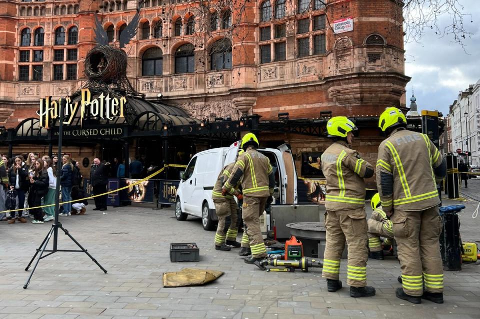 Firefighters and emergency services attend an emergency outside the Palace Theatre in Cambridge Circus (Getty Images)