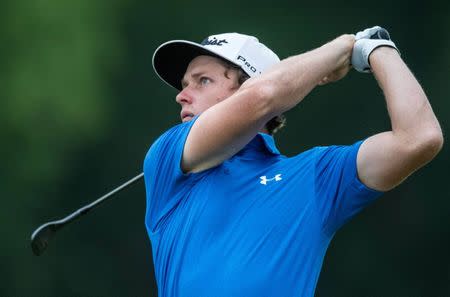 Apr 28, 2017; Avondale, LA, USA; Cameron Smith watches his shot from the rough on the 10th hole during the second round of the Zurich Classic of New Orleans golf tournament at TPC Louisiana. Mandatory Credit: Stephen Lew-USA TODAY Sports