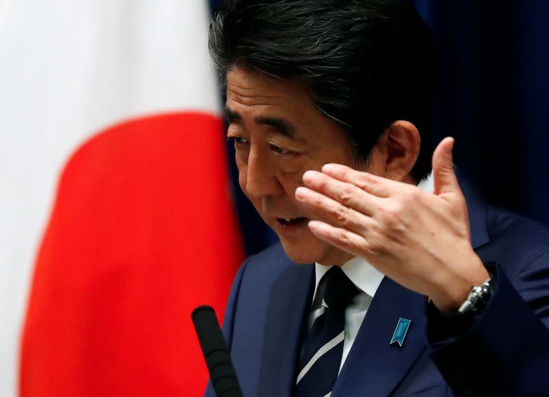 Japan's Prime Minister Shinzo Abe attends a news conference on coronavirus at his official residence in Tokyo