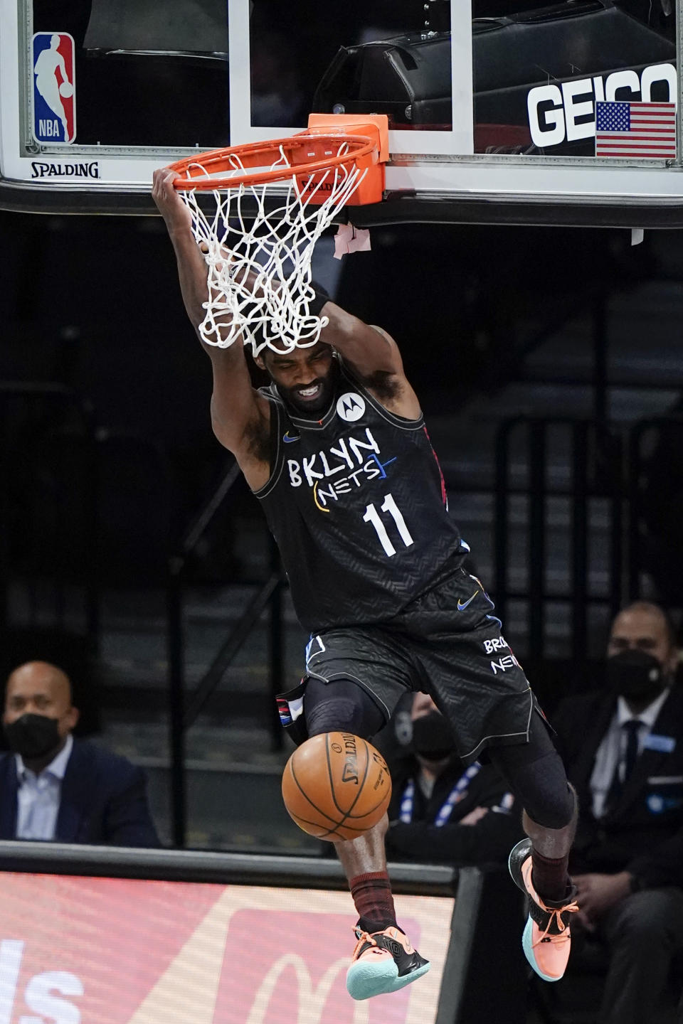 Brooklyn Nets' Kyrie Irving (11) dunks the ball during the second half of an NBA basketball game against the New York Knicks Monday, April 5, 2021, in New York. (AP Photo/Frank Franklin II)