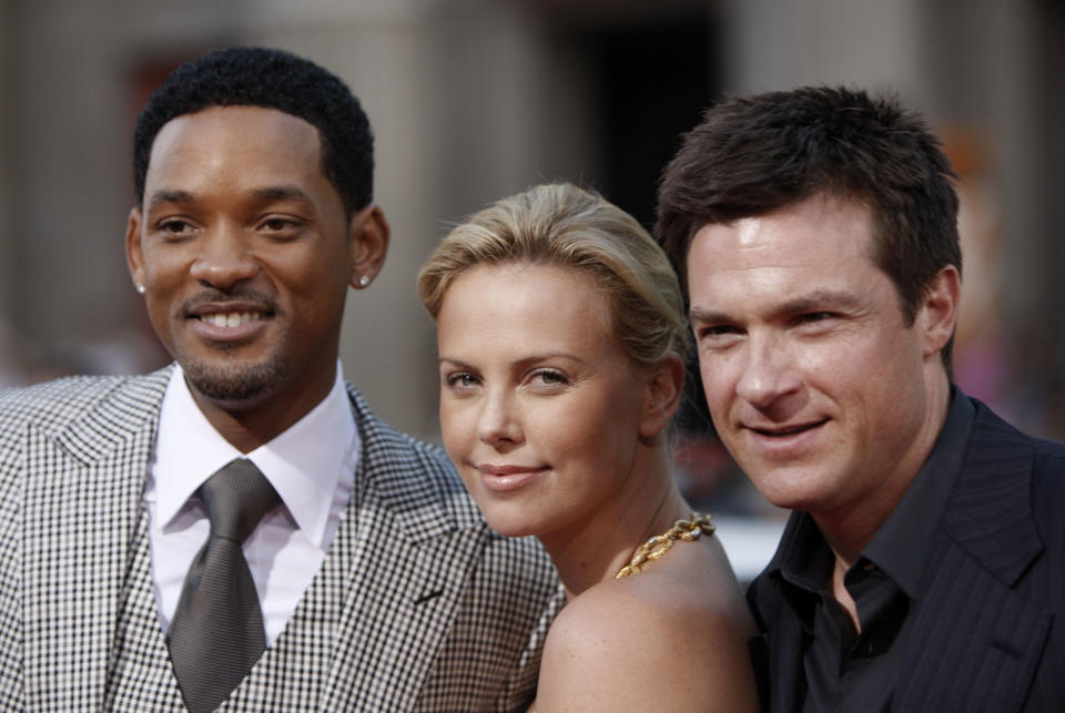 Actors Will Smith, left, Charlize Theron, center, and Jason Bateman arrive at the "Hancock" premiere Monday June 30, 2008, in Los Angeles. (AP Photo/ Matt Sayles)