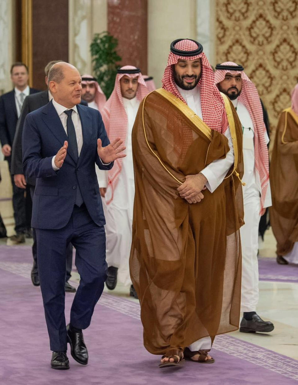 In this photo released by Saudi Press Agency, SPA, Saudi Crown Prince Mohammed bin Salman, right, receives Chancellor Olaf Scholz, Saturday, Sept. 24, 2022, in Jeddah, Saudi Arabia. (Saudi Press Agency via AP)