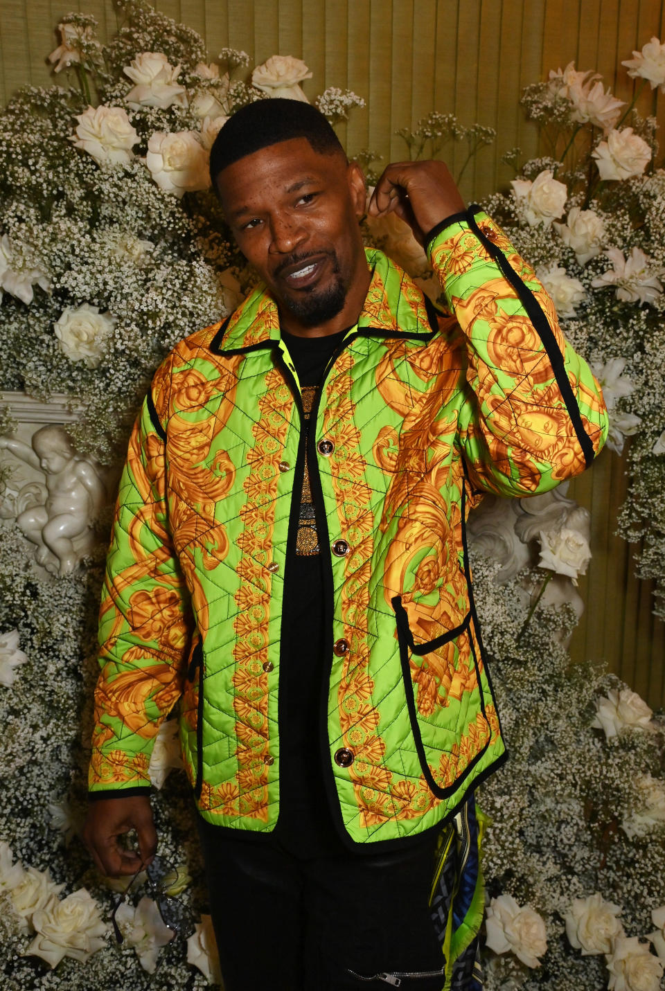 Closeup of Jamie Foxx smiling at an event