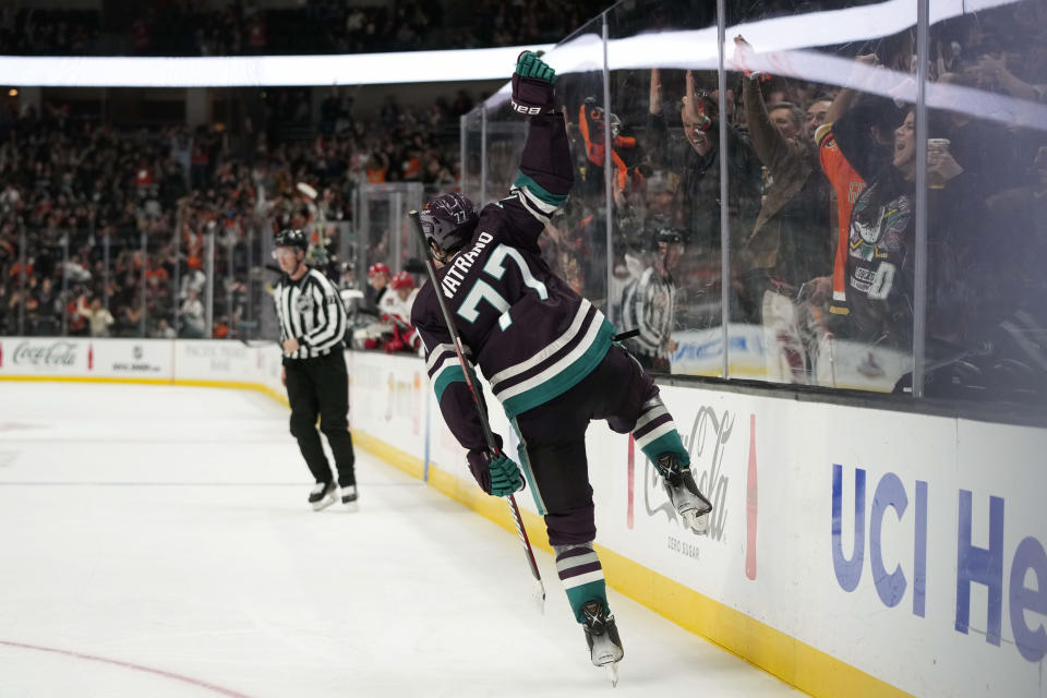 Anaheim Ducks' Frank Vatrano celebrates his hat-trick during the third period of an NHL hockey game against the Carolina Hurricanes, Sunday, Oct. 15, 2023, in Anaheim, Calif. The Ducks won 6-3. (AP Photo/Jae C. Hong)